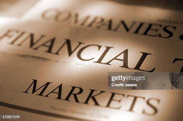 sepia toned financial newspapers - broadsheet newspaper stock pictures, royalty-free photos & images