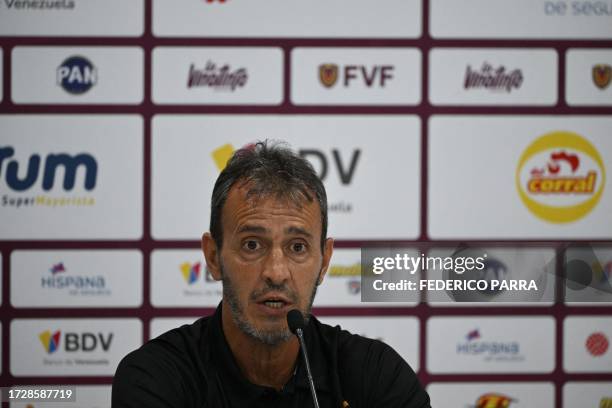 Venezuela's Argentine coach Fernando Batista speaks during a press conference before a training session at the Monumental stadium in Maturin, Monagas...