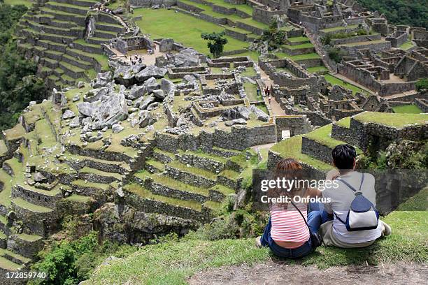 Young Couple Looking at Machu Picchu, Peru