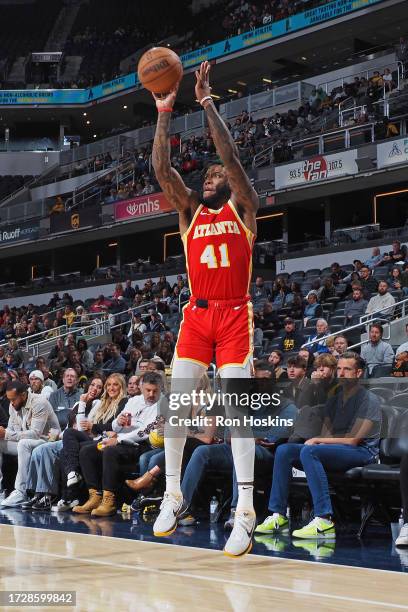 Saddiq Bey of the Atlanta Hawks shoots a three point basket against the Indiana Pacers on October 16, 2023 at Gainbridge Fieldhouse in Indianapolis,...