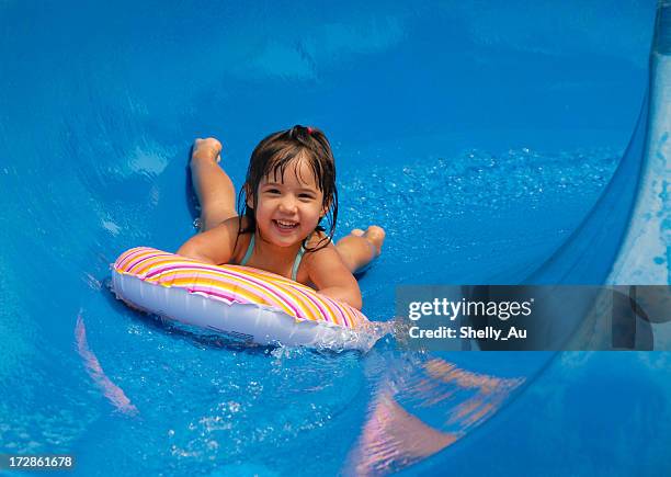 summer pool sliding - water slide stock pictures, royalty-free photos & images