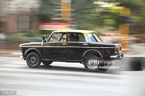 speeding taxi in mumbai, india - taxi stock pictures, royalty-free photos & images