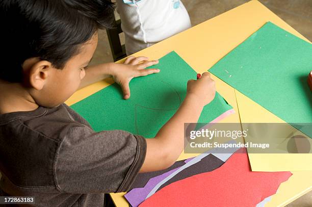 Boy Using Paper 543 Boy Cutting Paper Stock Photos, High-Res Pictures, and Images ...