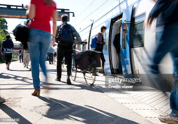 train passengers entering commuter carriage - commuter bus stock pictures, royalty-free photos & images