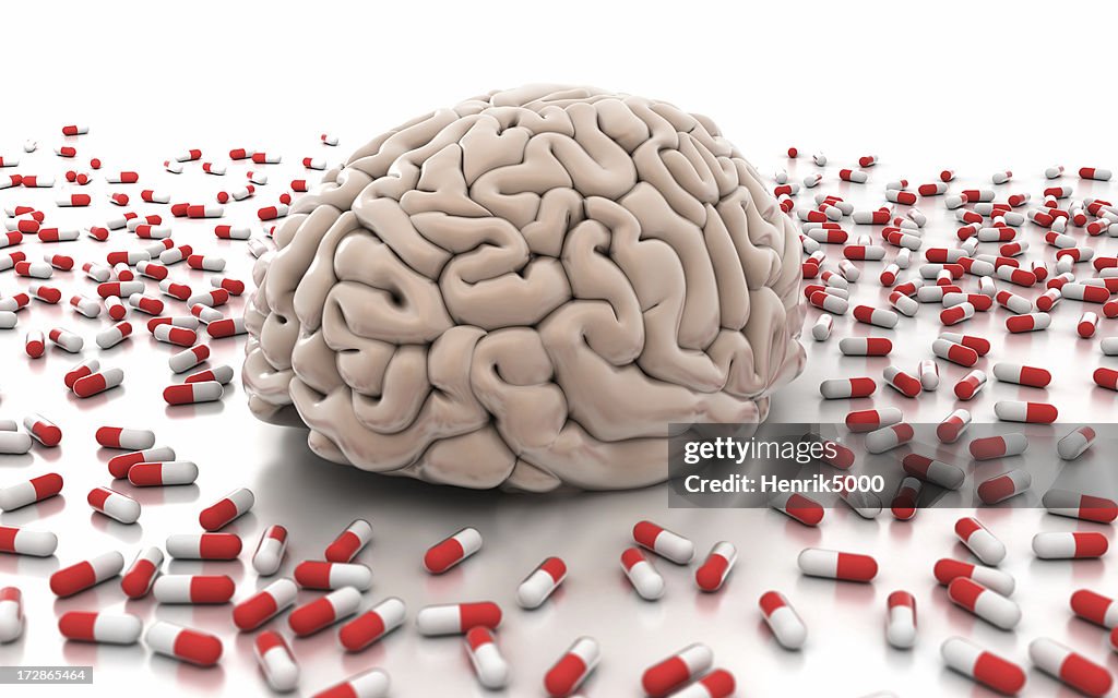Brain surrounded by pills