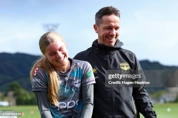 Daisy Brazendale and coach Paul Temple enjoy a laugh during a Wellington Phoenix A-League Women media opportunity at NZCIS on October 11, 2023 in...