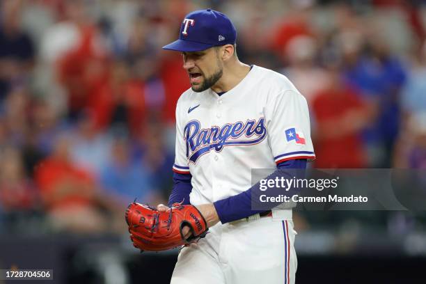 Nathan Eovaldi of the Texas Rangers reacts after the last out in the fifth inning was recorded against the Baltimore Orioles in Game Three of the...