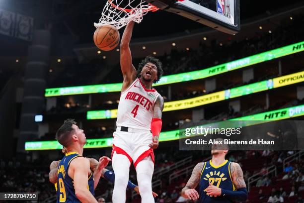 Jalen Green of the Houston Rockets dunks the ball in the third quarter of the preseason game against the Indiana Pacers at Toyota Center on October...