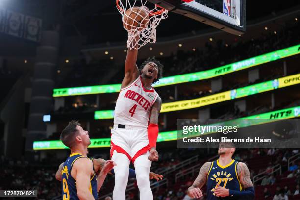 Jalen Green of the Houston Rockets dunks the ball in the third quarter of the preseason game against the Indiana Pacers at Toyota Center on October...