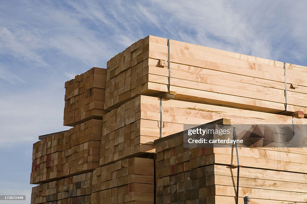 Stack of lumber in lumberyard or construction site