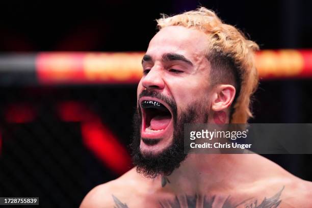 Ramon Taveras reacts after his victory against Cortavious Romious in a featherweight fight during Dana White's Contender Series season seven, week...