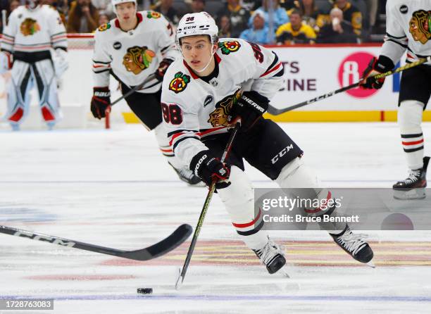 Connor Bedard of the Chicago Blackhawks skates during the third period against the Pittsburgh Penguins at PPG PAINTS Arena on October 10, 2023 in...