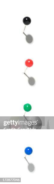 four colorful push pins w/shadows-isolated on white - push pin stock pictures, royalty-free photos & images