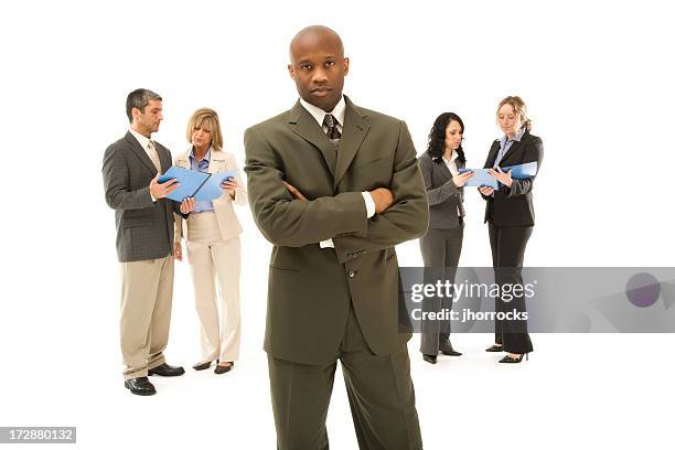 confident businessman and his team - real businessman isolated no smile stock pictures, royalty-free photos & images