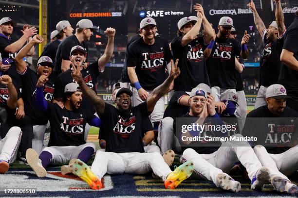 Texas Rangers players celebrate after defeating the Baltimore Orioles in Game Three of the Division Series at Globe Life Field on October 10, 2023 in...