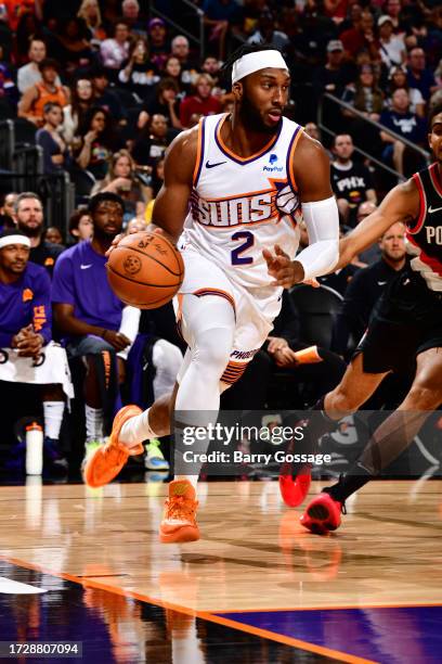 Josh Okogie of the Phoenix Suns drives to the basket during the game against the Portland Trail Blazers on October 16, 2023 at Footprint Center in...