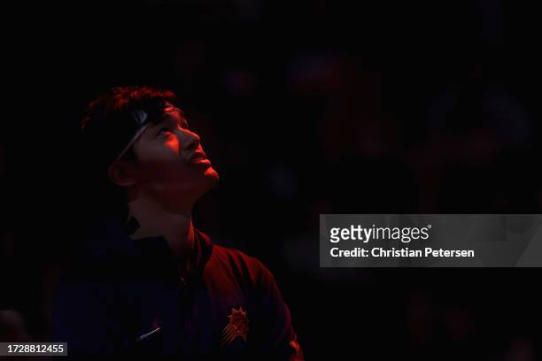 Yuta Watanabe of the Phoenix Suns stands on the court before the NBA game against the Denver Nuggets at Footprint Center on October 10, 2023 in...