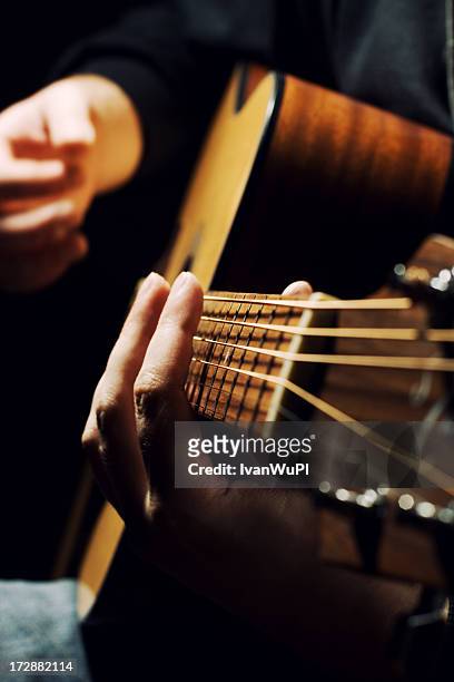 guitarist - acoustic guitar stock pictures, royalty-free photos & images