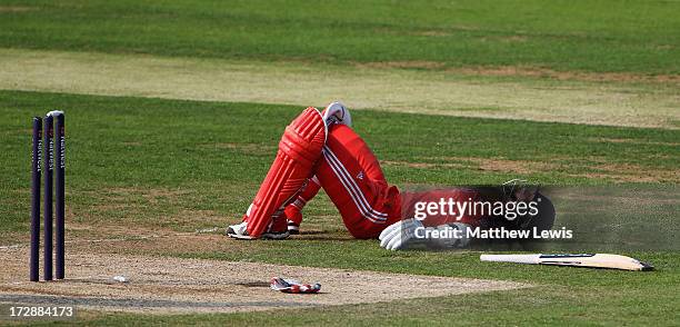 Arran Brindle of England looks on, after being run out by Batool Fatima of Pakistan during the 2nd NatWest Women's International T20 match between...