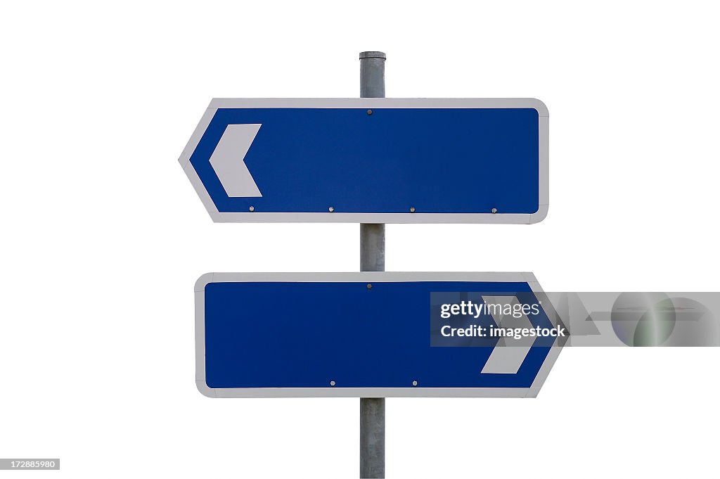 Blank blue and white signs pointing in different directions