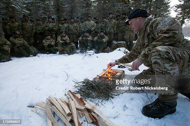 British Royal Marines receive instruction during survival exercises March 4, 2013 at the Allied Arctic Training Center in Bardufoss, Norway. Staying...