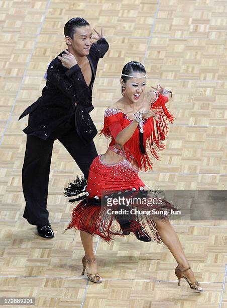 Yuki Suzuki and partner Ayaka Harada of Japan compete in the Dancesport- Latin Samba Final at Samsan World Gymnasium during day seven of the 4th...