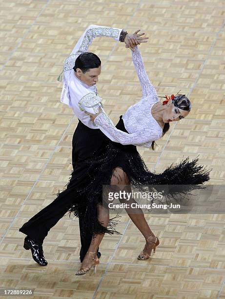 Aleksei Kibkalo and partner Tatiana Kogadei of Kazakhstan compete in the Dancesport- Latin Paso Doble Final at Samsan World Gymnasium during day...