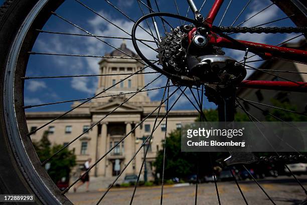 The Manitoba Legislative Building stands in Winnipeg, Manitoba, Canada, on Thursday, July 4, 2013. Canada extended the longest streak of merchandise...