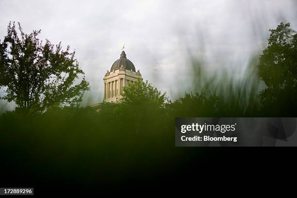 The Manitoba Legislative Building stands in Winnipeg, Manitoba, Canada, on Thursday, July 4, 2013. Canada extended the longest streak of merchandise...