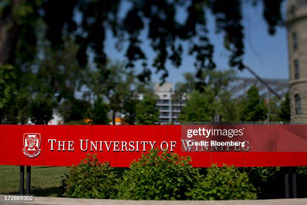 University of Winnipeg sign stands in this photo taken with a tilt shift lens in Winnipeg, Manitoba, Canada, on Thursday, July 4, 2013. Canada...
