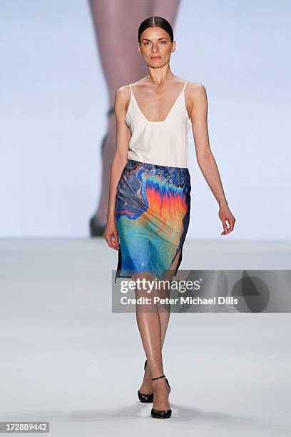 Model wearing clothes designed by Ece Goezen walks the runway at the Ece Goezen, Nazli Bozdag, Nevra Karaca No. 7 Show during Mercedes-Benz Fashion...