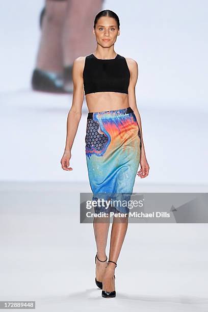 Model wearing clothes designed by Ece Goezen walks the runway at the Ece Goezen, Nazli Bozdag, Nevra Karaca No. 7 Show during Mercedes-Benz Fashion...