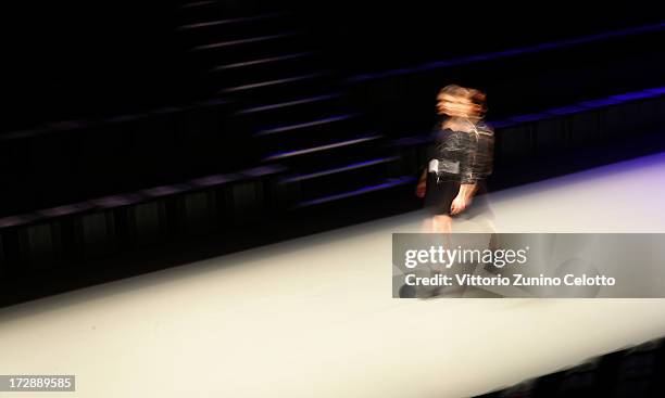 Model walks the runway during rehearsal ahead of the Ece Goezen, Nazli Bozdag, Nevra Karaca No. 7 Show during Mercedes-Benz Fashion Week...