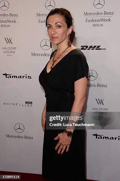 Ilknur Boyraz attends the Miranda Konstantinidou Arrivals at Brandenburg Gate on July 5, 2013 in Berlin, Germany.