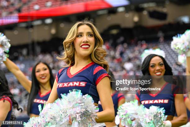 Houston Texans cheerleaders rev up the crowd during the football game between the New Orleans Saints and Houston Texans at NRG Stadium on October 15...