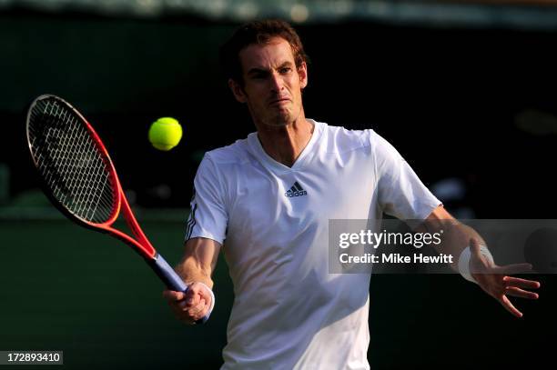 Andy Murray of Great Britain volleys during the Gentlemen's Singles semi-final match against Jerzy Janowicz of Poland on day eleven of the Wimbledon...