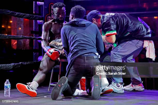 Patrick Okine gets treatment in his corner during his welterweights bout with Cletus Seldin at BoxingInsider Fight Night at Sony Hall on October 10,...