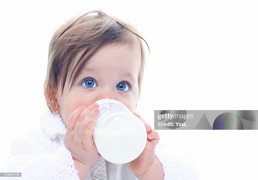 Baby with milk bottle