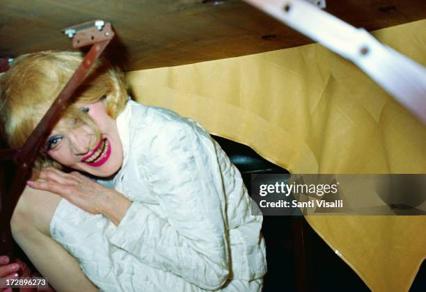 Actress Marlene Dietrich hiding under a table on October 13,1967 in New York, New York.