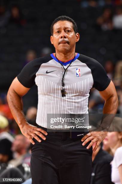 Referee Bill Kennedy looks on during the game between the Portland Trail Blazers and the Phoenix Suns on October 16, 2023 at Footprint Center in...