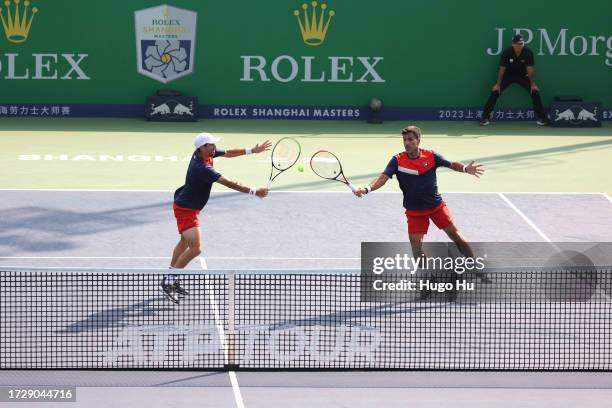 Maximo Gonzalez and Andres Molteni of Argentina competes against Rinky Hijikata of Australia and Cameron Norrie of Great Britain in their men's...