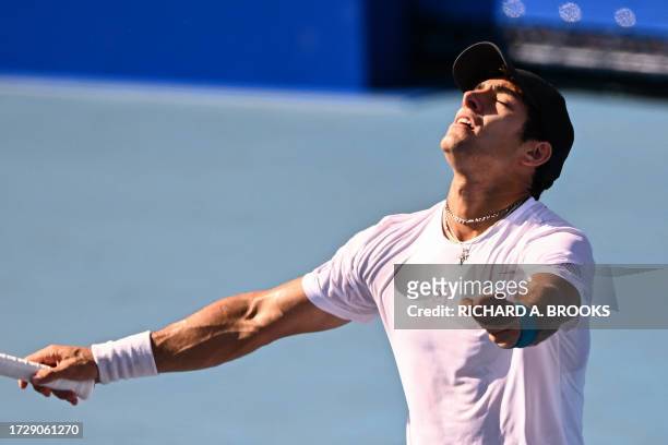 Cristian Garin of Chile celebrates his victory over Sho Shimabukuro of Japan in their men's singles match on day two of the ATP Japan Open tennis...