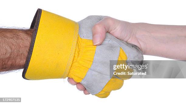 handshake: one hand with work glove - blue collar construction isolated stock pictures, royalty-free photos & images