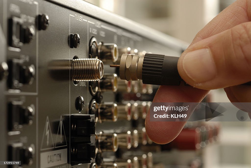 Video Cable being inserted into electronic equipment