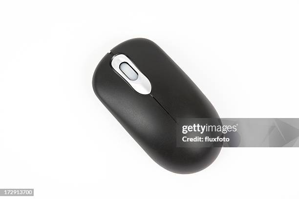 wireless mouse - black-hand-on-mouse stock pictures, royalty-free photos & images