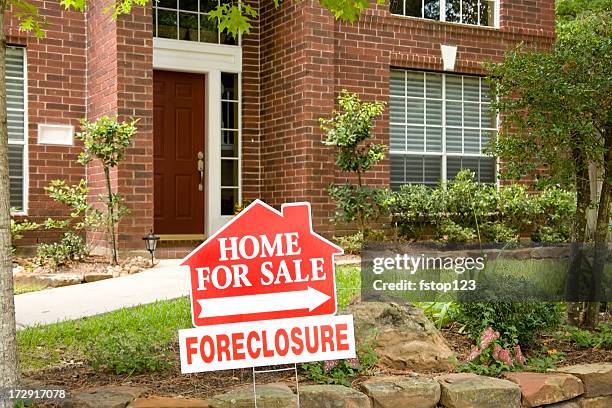real estate sign. home for sale. foreclosure. red brick house. - foreclosure stock pictures, royalty-free photos & images