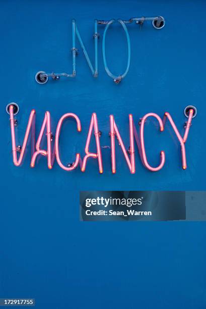 no vacancy - motel sign - no vacancies stock pictures, royalty-free photos & images