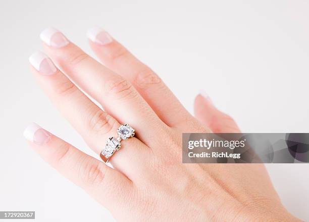 close up of a woman's hand - diamond ring stock pictures, royalty-free photos & images