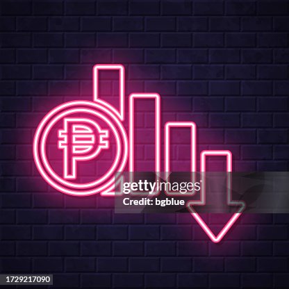 Peso rate decrease. Glowing neon icon on brick wall background Peso rate decrease. Glowing neon icon on brick wall background
