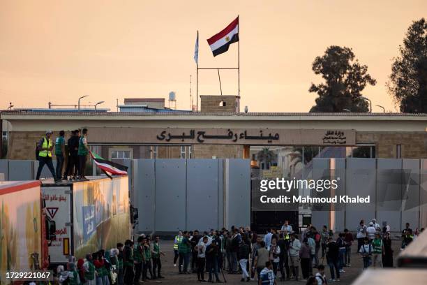 Volunteers and NGOs stuff are seen at Rafah border on October 17, 2023 in North Sinai, Egypt. The aid convoy, organized by a group of Egyptian NGOs,...